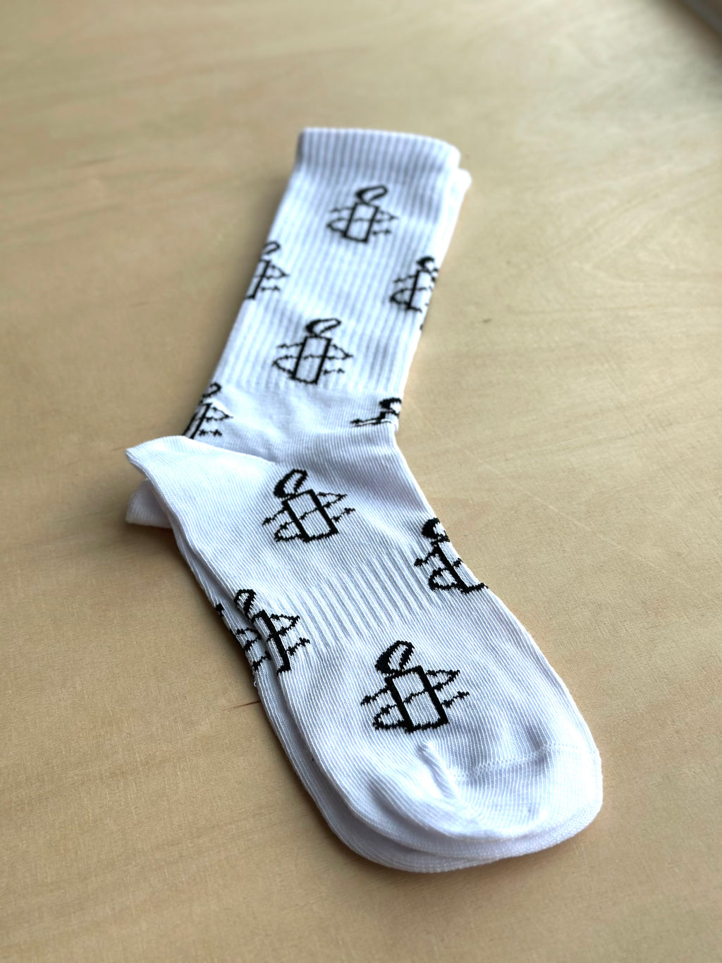 Strømper med Amnesty logo