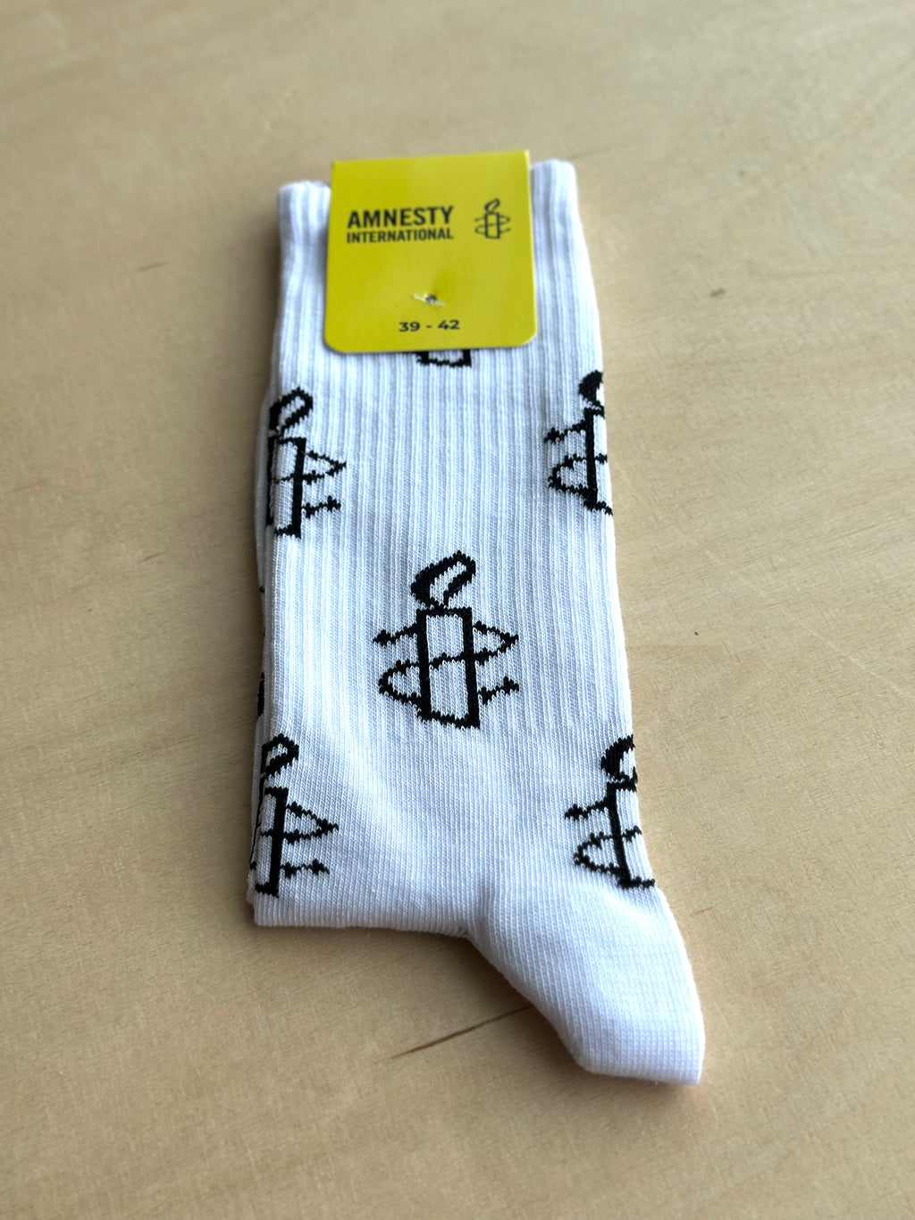 Strømper med Amnesty logo